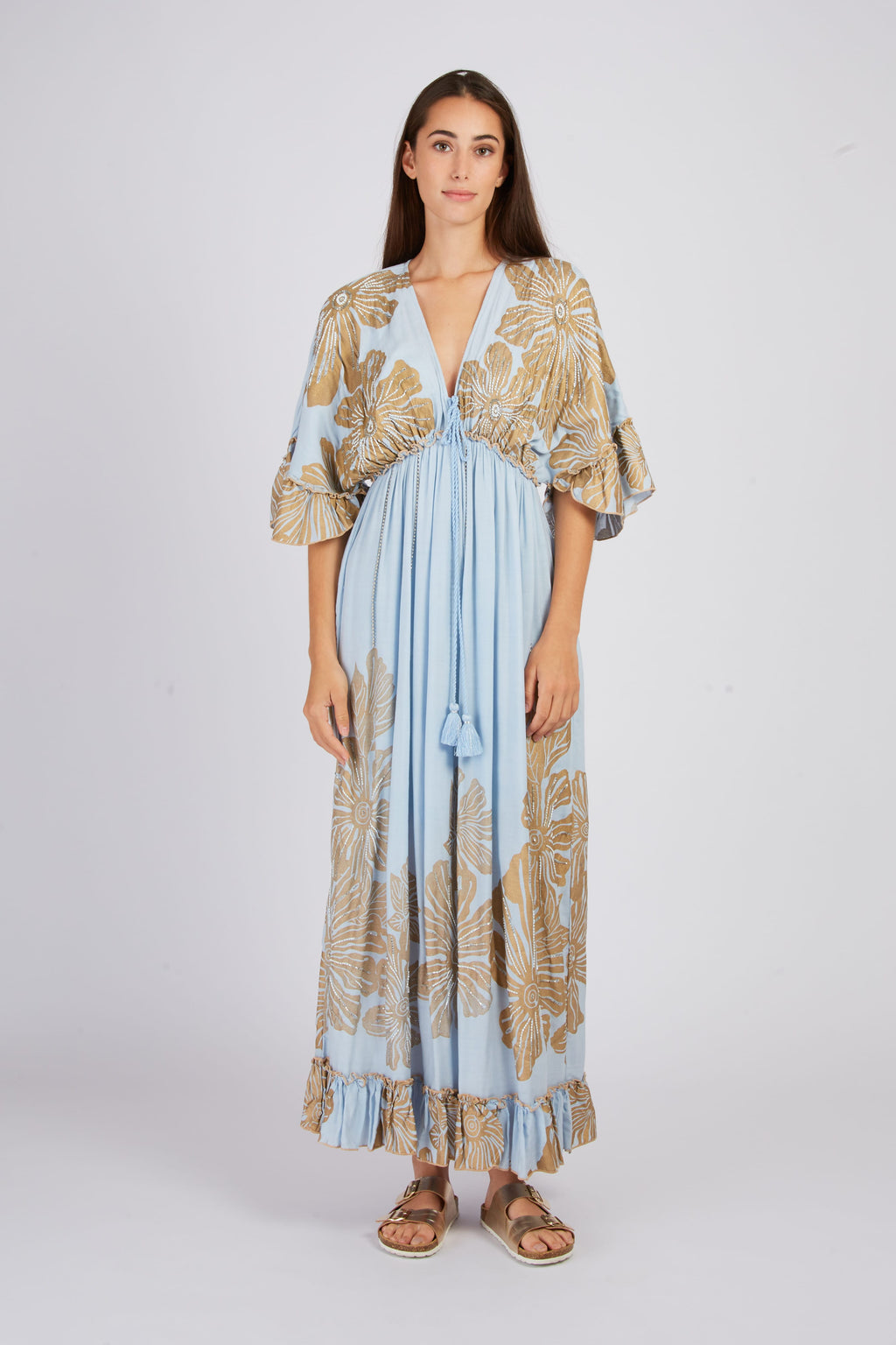 Women's blue and gold floral maxi dress with tassel detail and empire waist