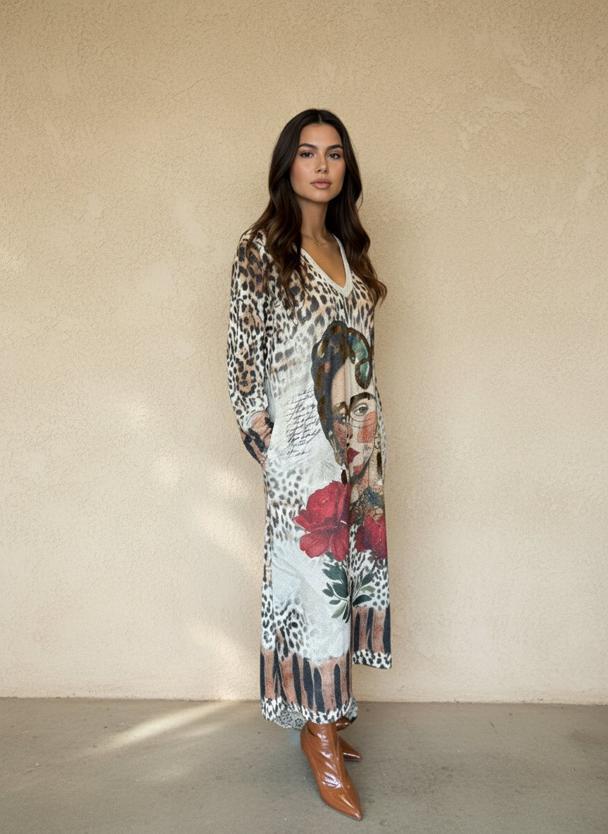 Side view of woman wearing printed leopard and floral maxi dress featuring artistic portrait design, styled with brown boots.