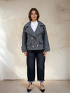 Full front view of grey peacoat styled with dark cuffed jeans and black pointed heels.